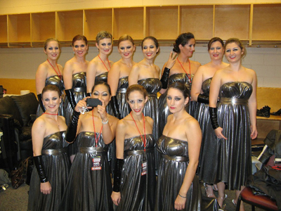Maria with her fellow musicians backstage before performing with Kanye West
